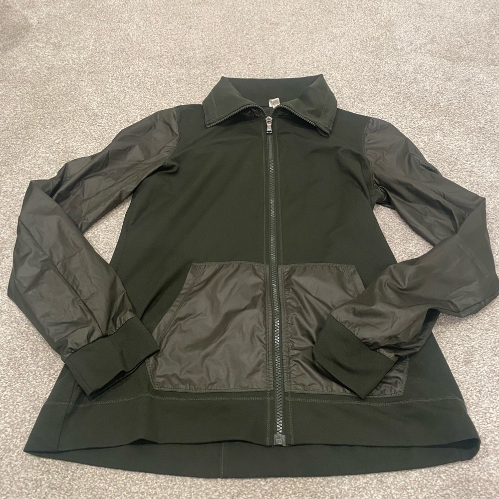 Army green under armour zip up. Size medium